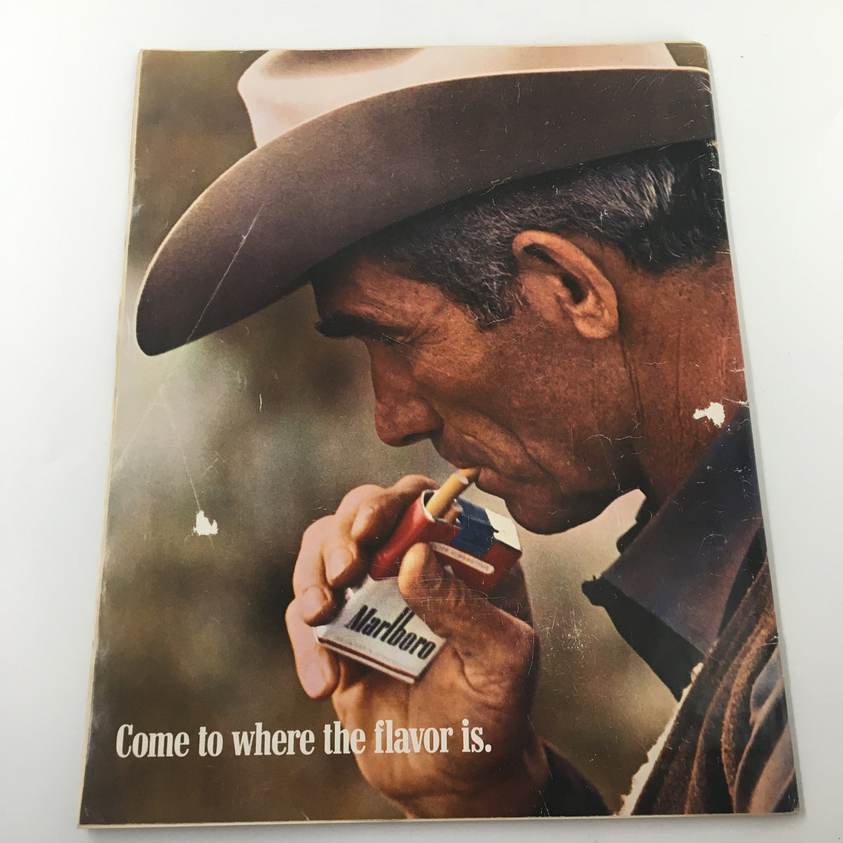 Back cover of Look Magazine March 18, 1969 featuring a vintage Marlboro advertisement with a cowboy thoughtfully smoking a cigarette.