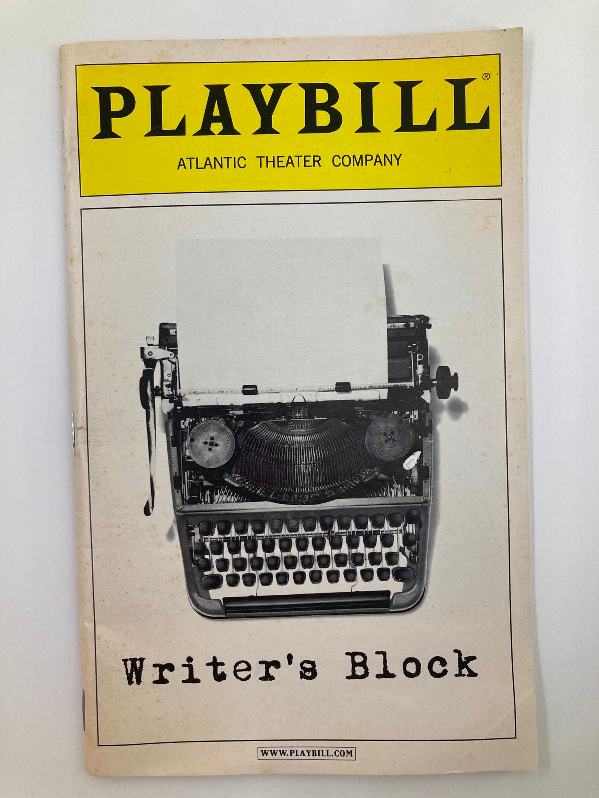 2003 Playbill for Woody Allen's 'Writer's Block,' featuring a vintage typewriter on the cover, showcasing theatrical artwork from the Atlantic Theater Company.