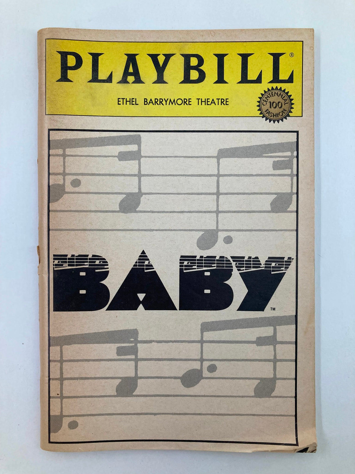 Cover of the 1984 Playbill for the musical 'Baby' at Ethel Barrymore Theatre featuring bold typography and musical notes.