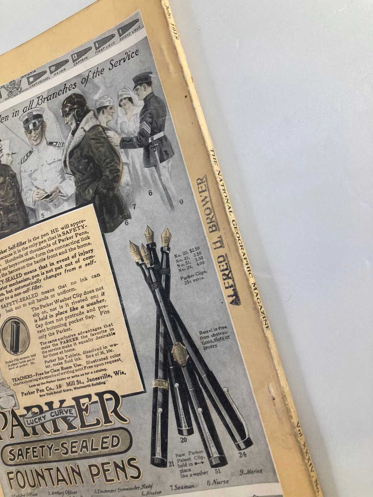 Page from VTG The National Geographic Magazine July 1918 illustrating advertisements and historical content related to the early 20th century, highlighting various services, products, and military themes.