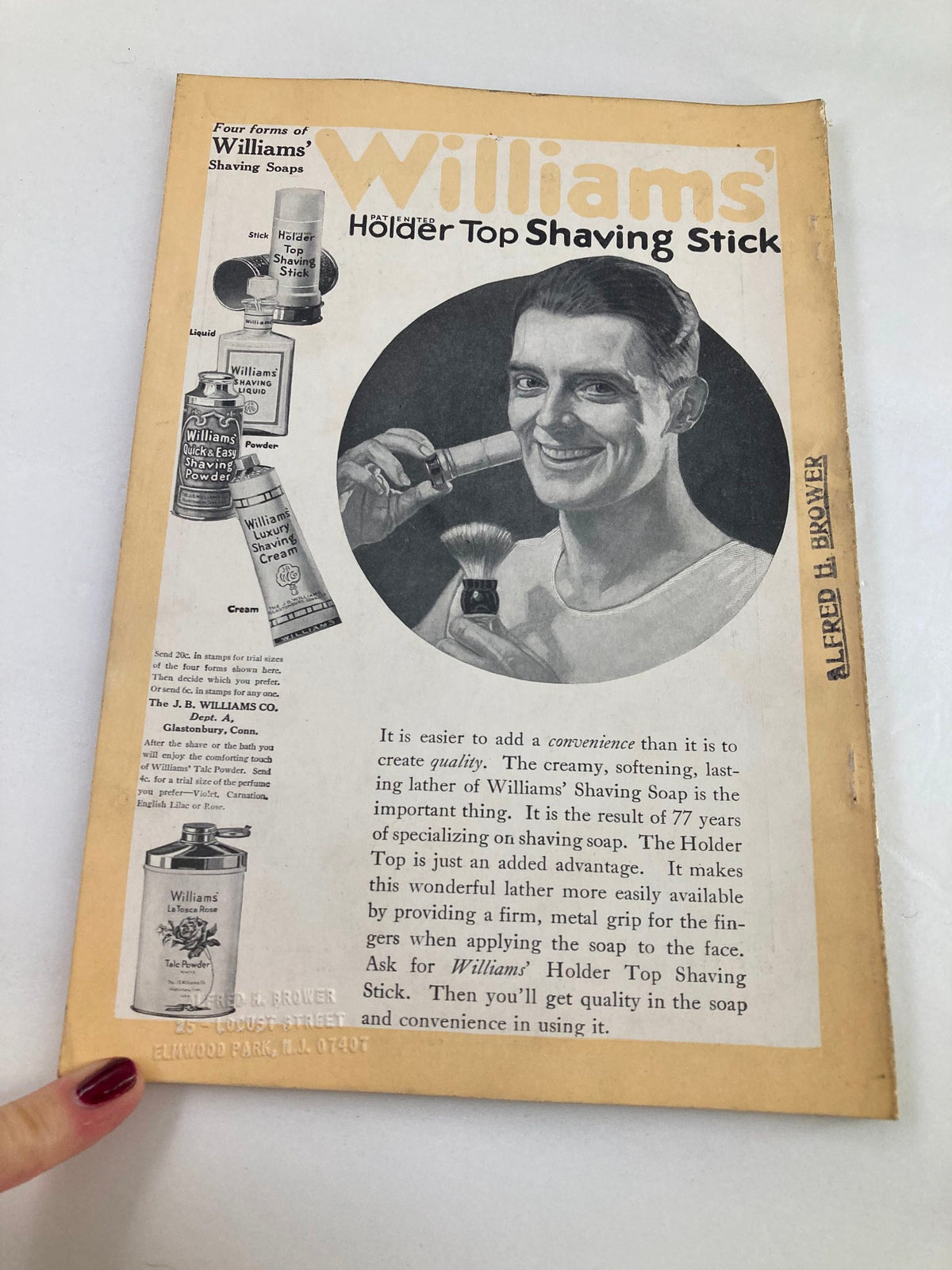 Advertisement page from the National Geographic Magazine August 1918 for Williams' Holder Top Shaving Stick, highlighting the product with an illustration of a man shaving.