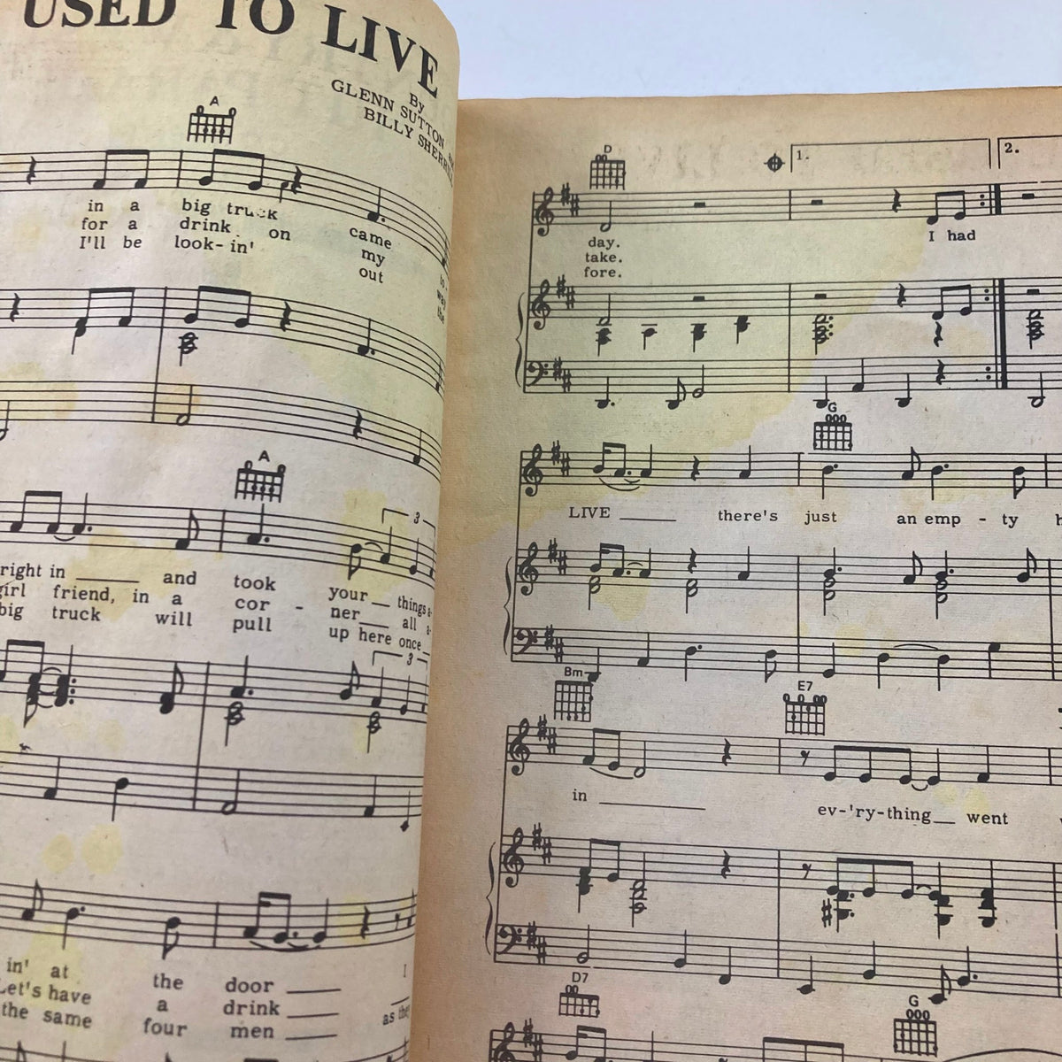 A page displaying sheet music from the Country & Western Hit Parade Magazine May 1969, showing lyrics and musical notations.