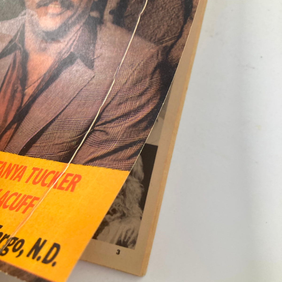 Close-up of VTG Country Song Roundup Magazine December 1983 cover showing Tanya Tucker and details of the magazine's special features.