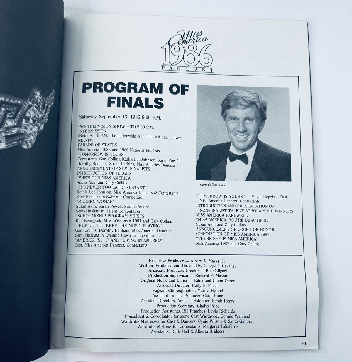 Interior page of the 1986 Miss America Pageant Official Program, detailing the program of finals featuring host Gary Collins and highlights of the event.