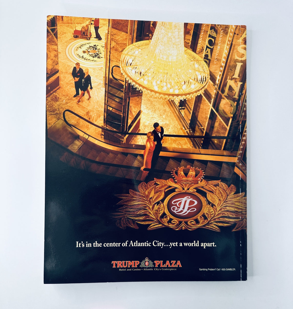 The 1997 Miss America Pageant Magazine Program featuring Tara Dawn Holland on the cover, showcasing an elegant interior scene from Trump Plaza in Atlantic City. The image highlights luxury and sophistication, with a chandelier and the iconic Trump Plaza logo.