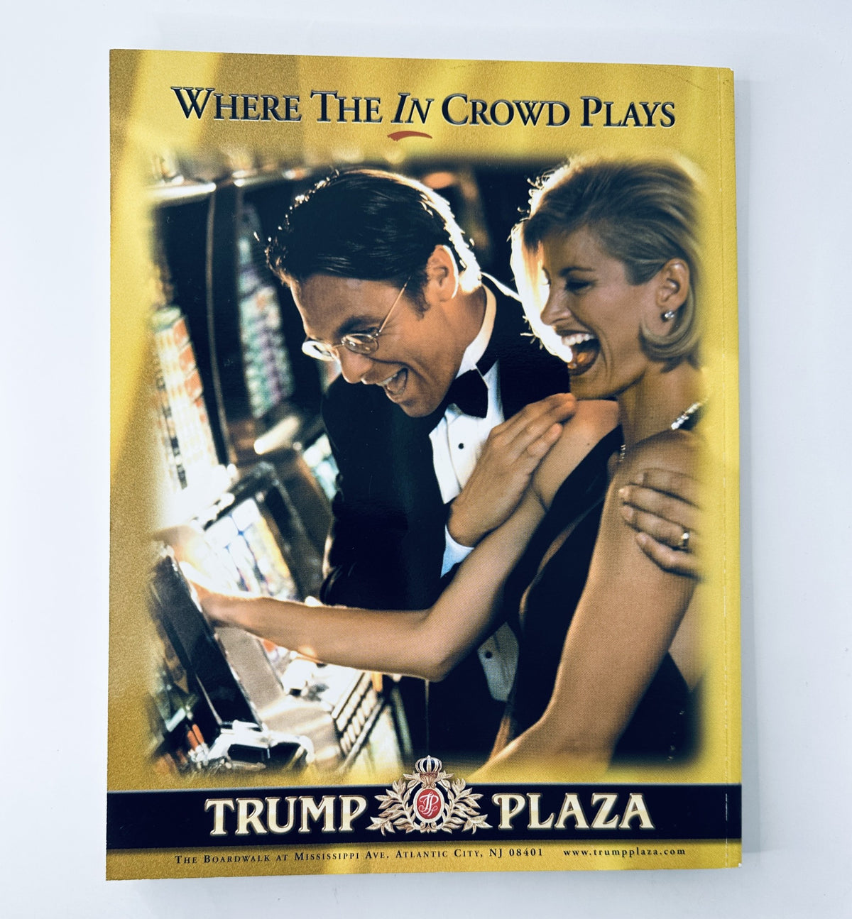 Advertisement from the 2000 Miss America Pageant Magazine Official Program for Trump Plaza, featuring a joyful couple playing slot machines, promoting the casino experience.