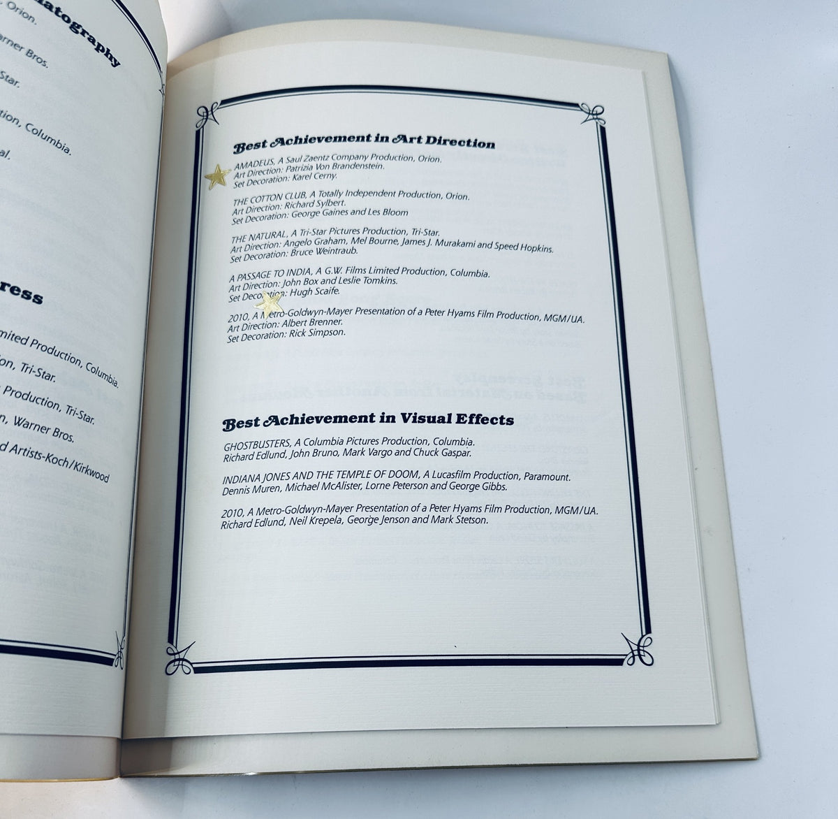 Interior page of Oscar Magazine 57th Annual Academy Awards Program, showcasing the nominees for Best Achievement in Art Direction and Best Achievement in Visual Effects.