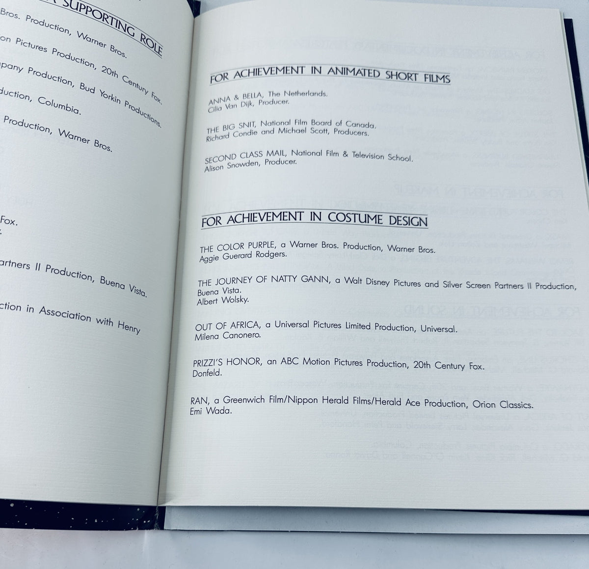 Interior page of the Oscar Magazine 58th Annual Academy Awards 1986 Program featuring sections for Achievement in Animated Short Films and Costume Design, highlighting notable productions like The Color Purple.