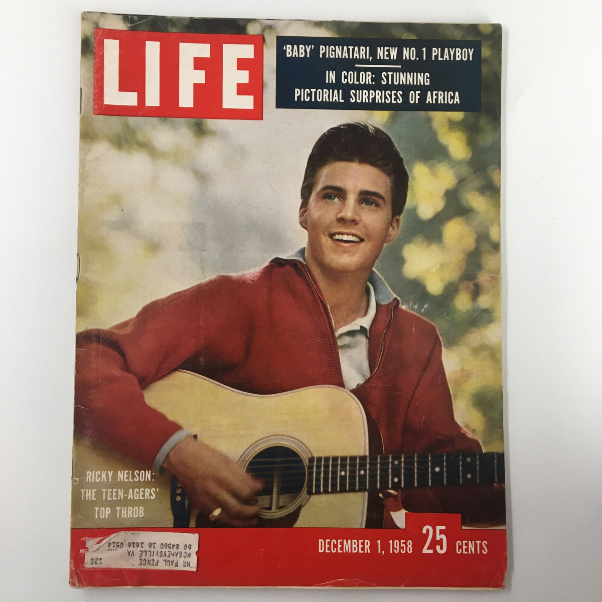 Cover of VTG Life Magazine from December 1, 1958 featuring Ricky Nelson, the Teen-Agers' top throb, showcasing him playing guitar and dressed in a red sweater.