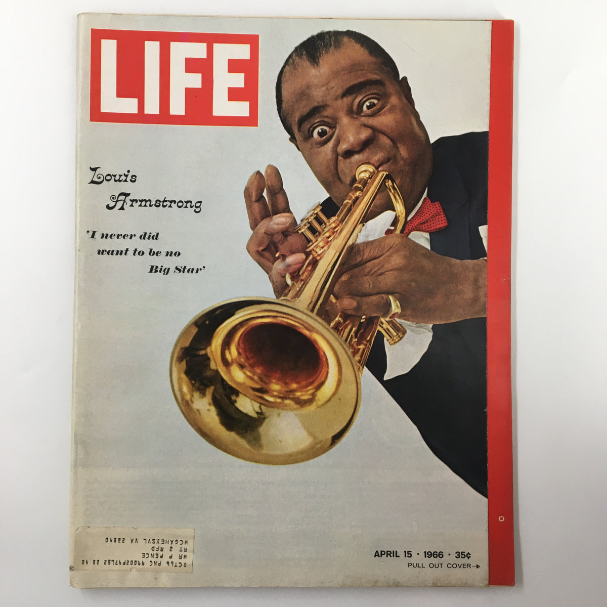 Cover of VTG Life Magazine dated April 15, 1966 featuring Louis Armstrong with the quote 'I never did want to be no Big Star', showcasing the iconic jazz musician playing a trumpet.