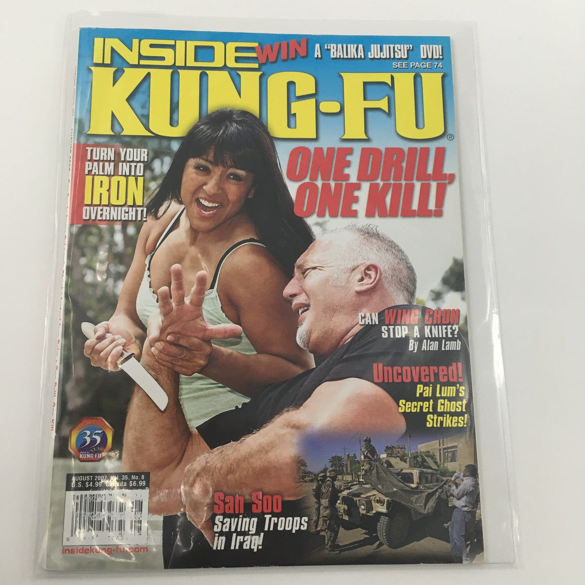 Cover of Inside Kung-Fu Magazine, August 2007 featuring the title 'Pau Lum's Secret Ghost Strikes', showcasing a martial arts scene with a woman demonstrating a technique on a man, ideal for collectors and martial arts enthusiasts.