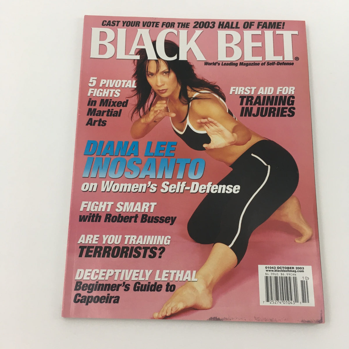 Cover of Black Belt Magazine October 2003 featuring Diana Lee Inosanto, showcasing self-defense techniques and martial arts insights.