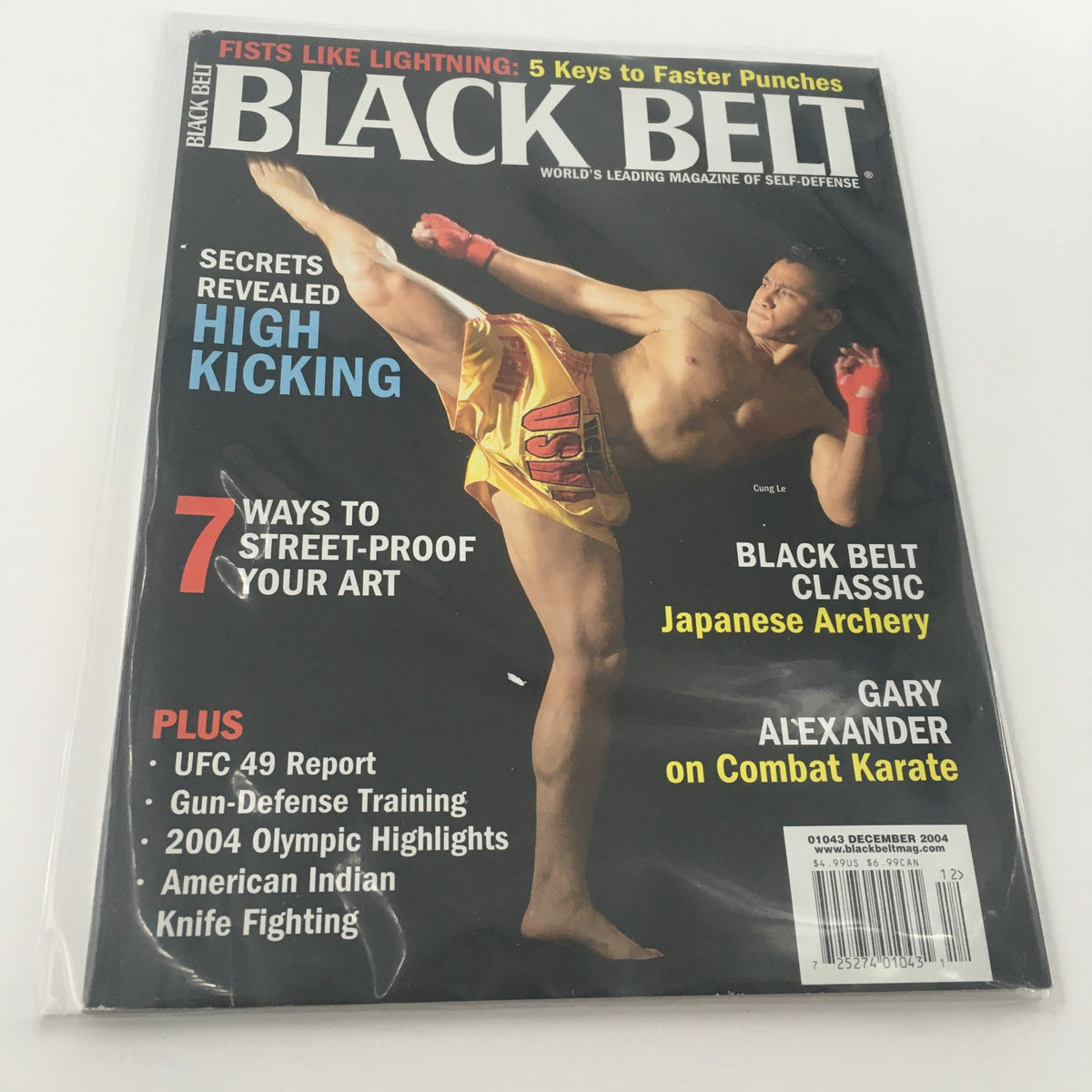 Black Belt Magazine December 2004 cover featuring Gary Alexander on Combat Karate with a dynamic image of a martial artist demonstrating high kicking techniques.