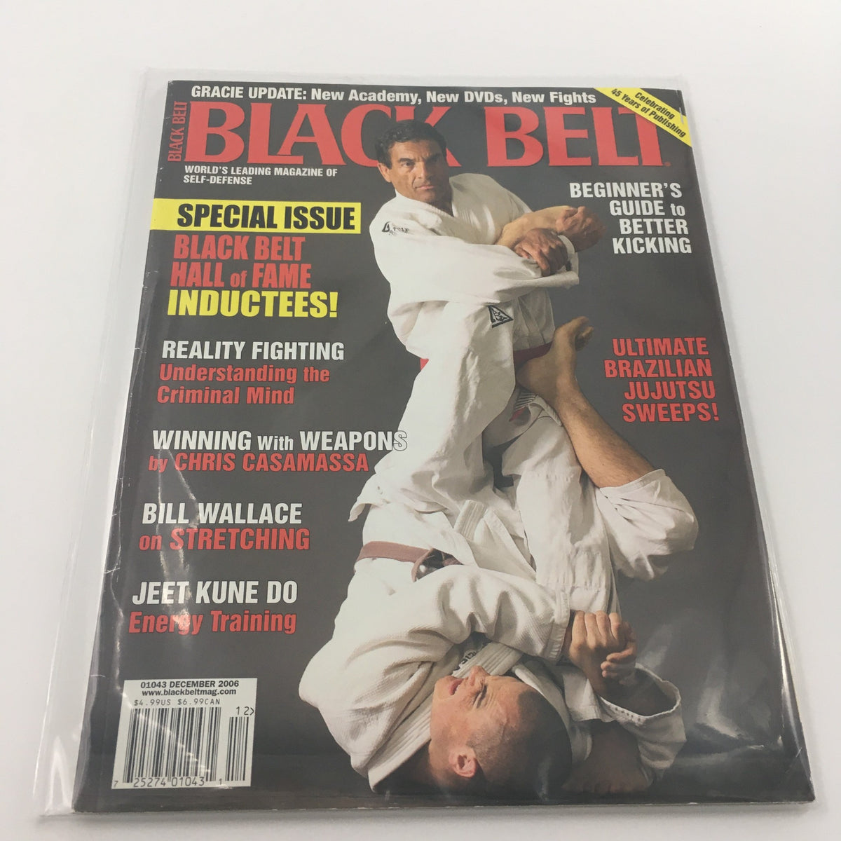 Black Belt Magazine December 2006 featuring Bill Wallace on Stretching, showcasing martial arts techniques with a special issue on Black Belt Hall of Fame inductees and various self-defense articles.