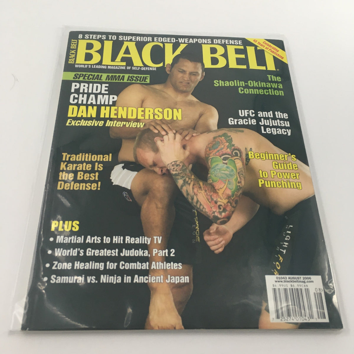 Cover of Black Belt Magazine August 2006 featuring Pride Champ Dan Henderson Interview, showcasing martial arts themes and training techniques.