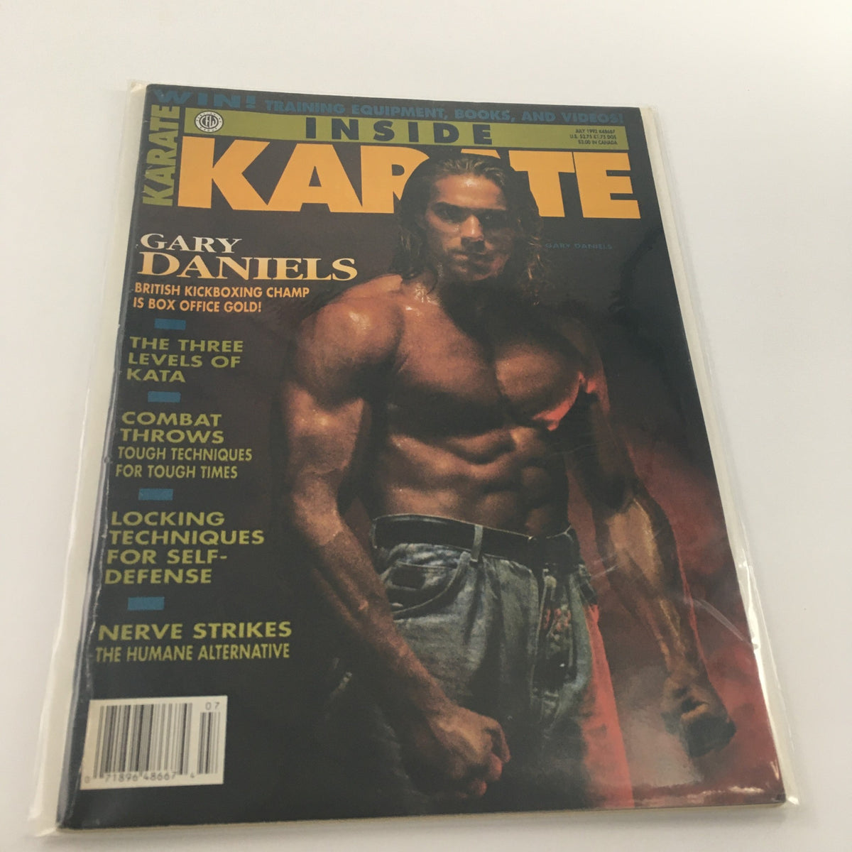 Cover of Inside Karate Magazine July 1992 featuring Gary Daniels, British Kickboxing Champion, showcasing martial arts topics including kata, combat throws, and self-defense techniques.