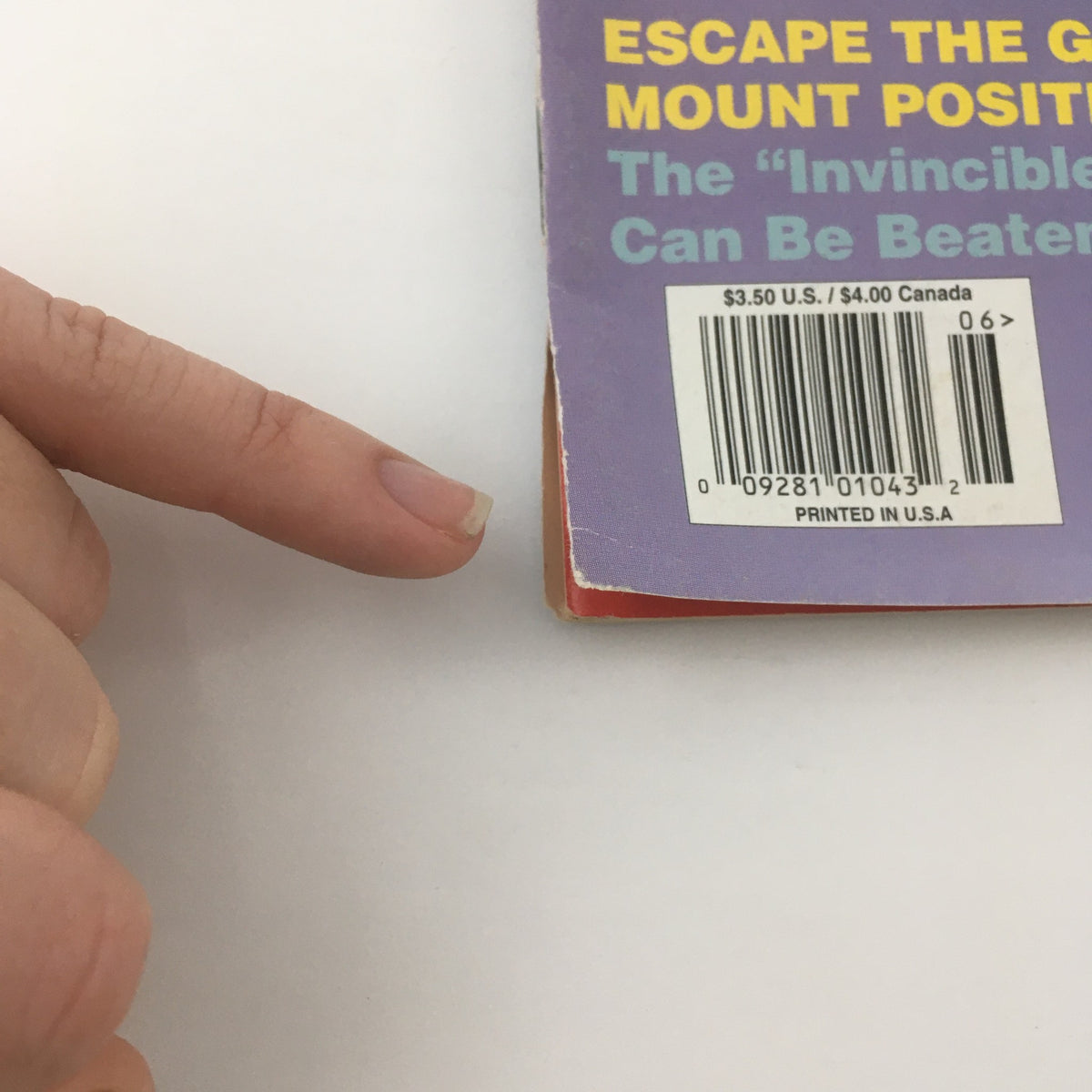 Black Belt Magazine June 1995 back cover detail showing bar code and text about escaping the Gracie Jujutsu mount position, a classic self-defense technique.
