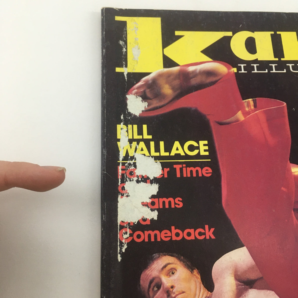 Close-up of the VTG Karate Illustrated July 1982 magazine cover featuring Bill Wallace, highlighting details of the 'Father Time' article and vibrant martial arts imagery.