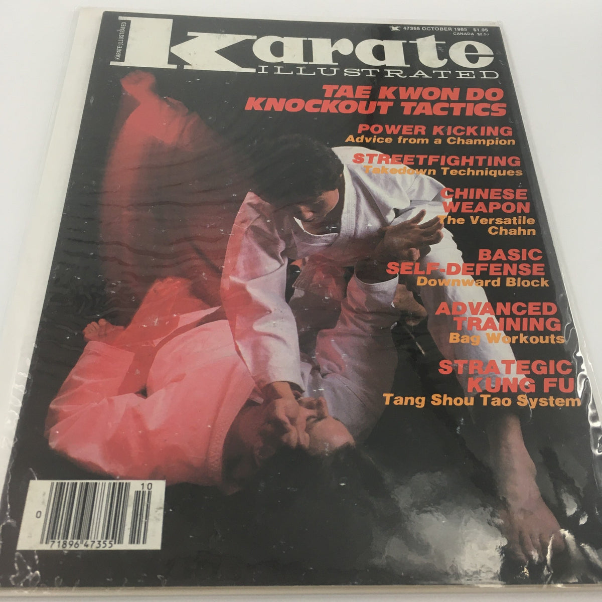 Cover of 'Karate Illustrated' October 1985 featuring articles on Tae Kwon Do knockout tactics, power kicking advice, streetfighting techniques, and self-defense strategies. Vintage martial arts magazine with a striking design.