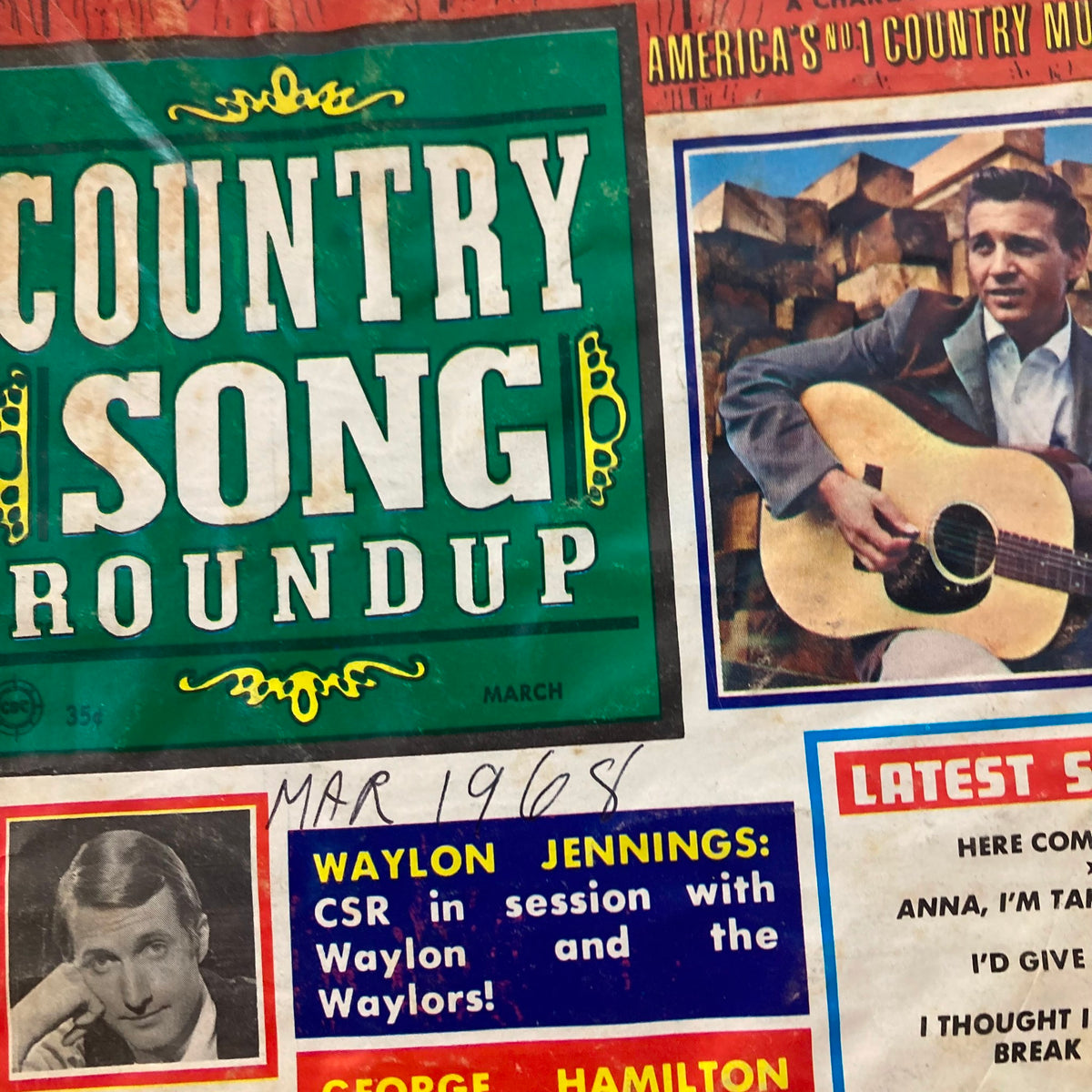 Close-up view of the cover of VTG Country Song Roundup Magazine March 1968 highlighting Waylon Jennings, George Hamilton IV, and latest song hits.