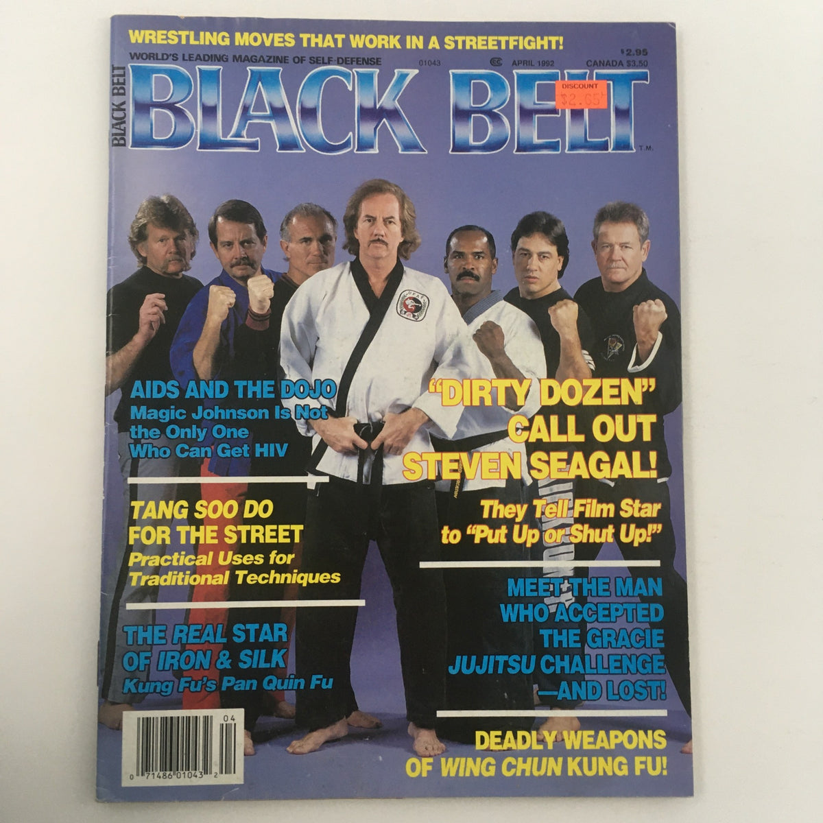Another angle of Black Belt Magazine April 1992, highlighting the 'Dirty Dozen Call Out Steven Seagal', with prominent features on martial arts techniques and a group of fighters.