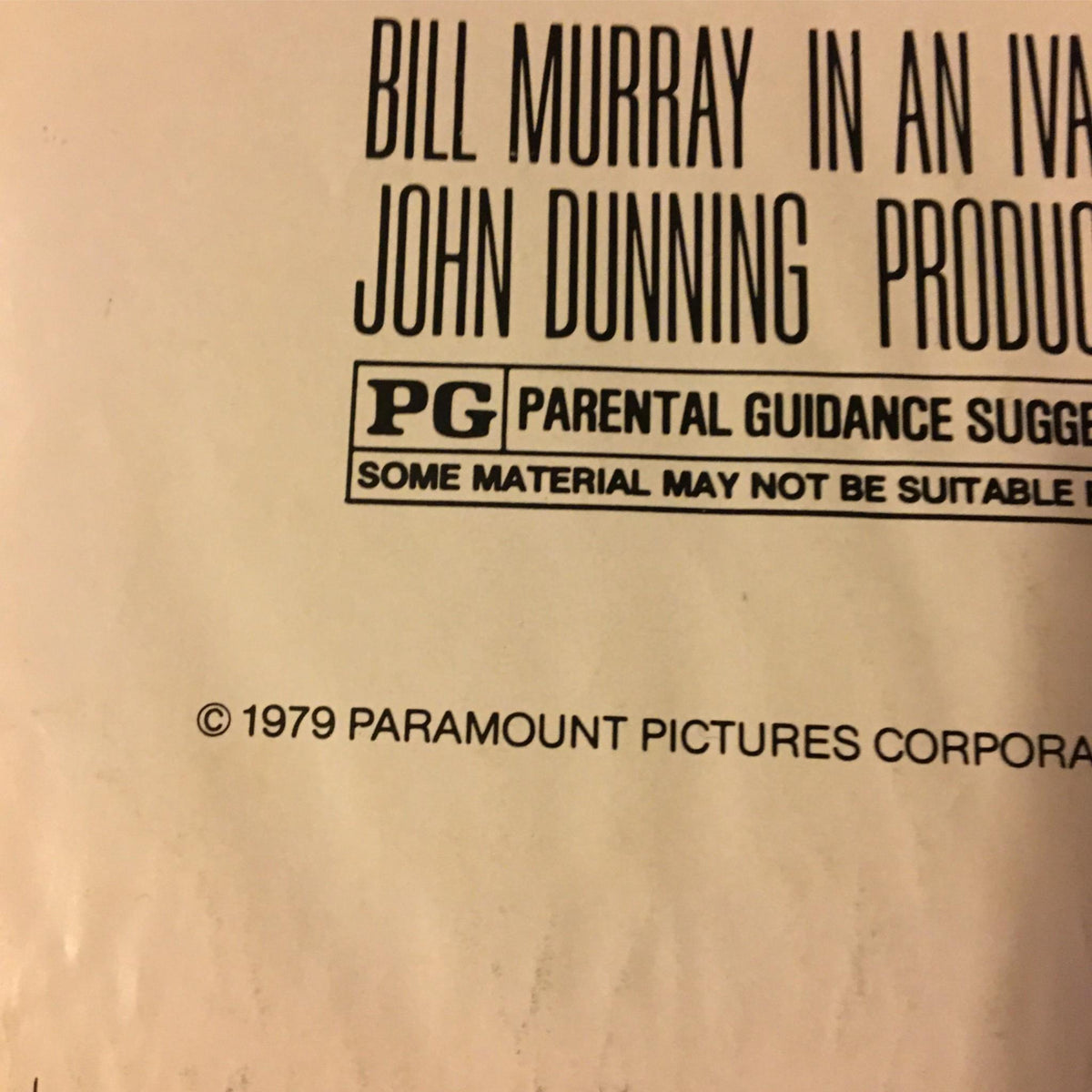 Close-up of copyright and parental guidance text from the 1979 Meatballs movie poster featuring Bill Murray, emphasizing its original authenticity.