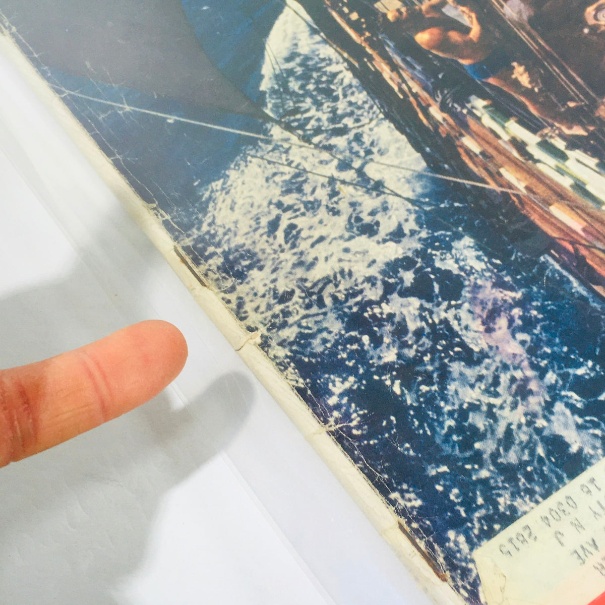 Close-up view of the edge and cover details of VTG Life Magazine: June 17, 1957 - Exclusive: From Aboard Ship - Mayflower Voyage, showcasing the vintage wear patterns and character of this collectible piece.