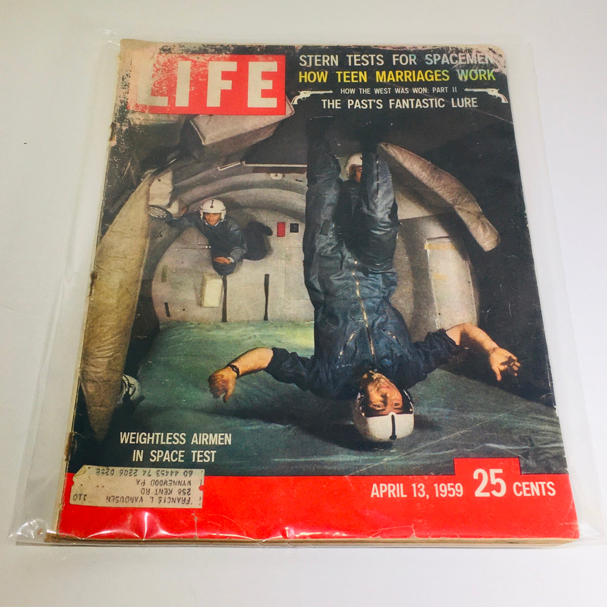 Vintage Life Magazine cover from April 13, 1959 featuring weightless airmen tests and stern tests for spacemen, showcasing historical space exploration themes.