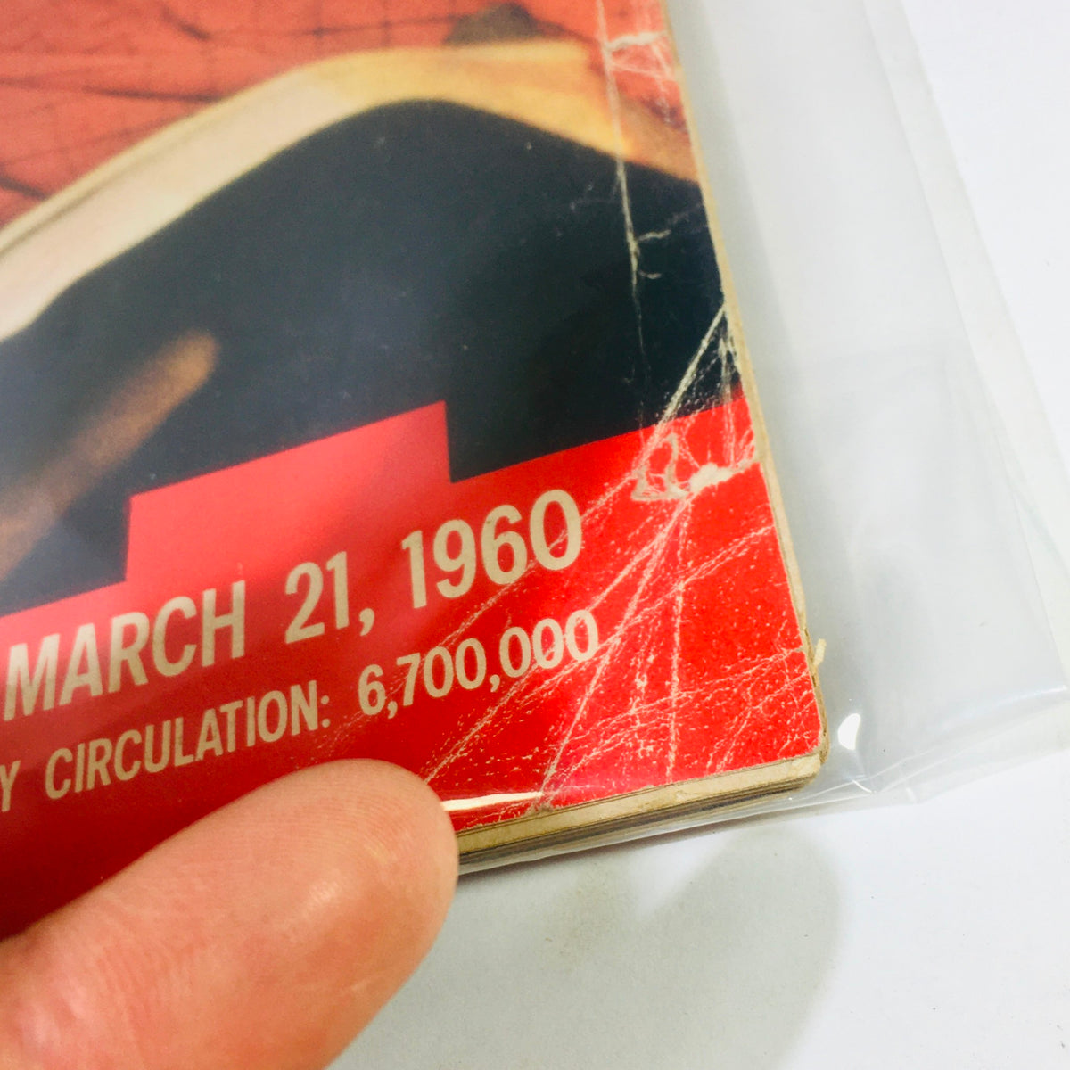 Close-up view of the March 21, 1960 issue of Life Magazine, highlighting the date and average weekly circulation, with visible wear.