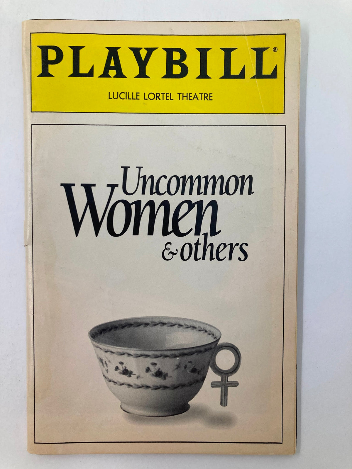 1994 Playbill from Lucille Lortel Theatre featuring the title 'Uncommon Women & Others' with a graphic of a bowl and female symbol.