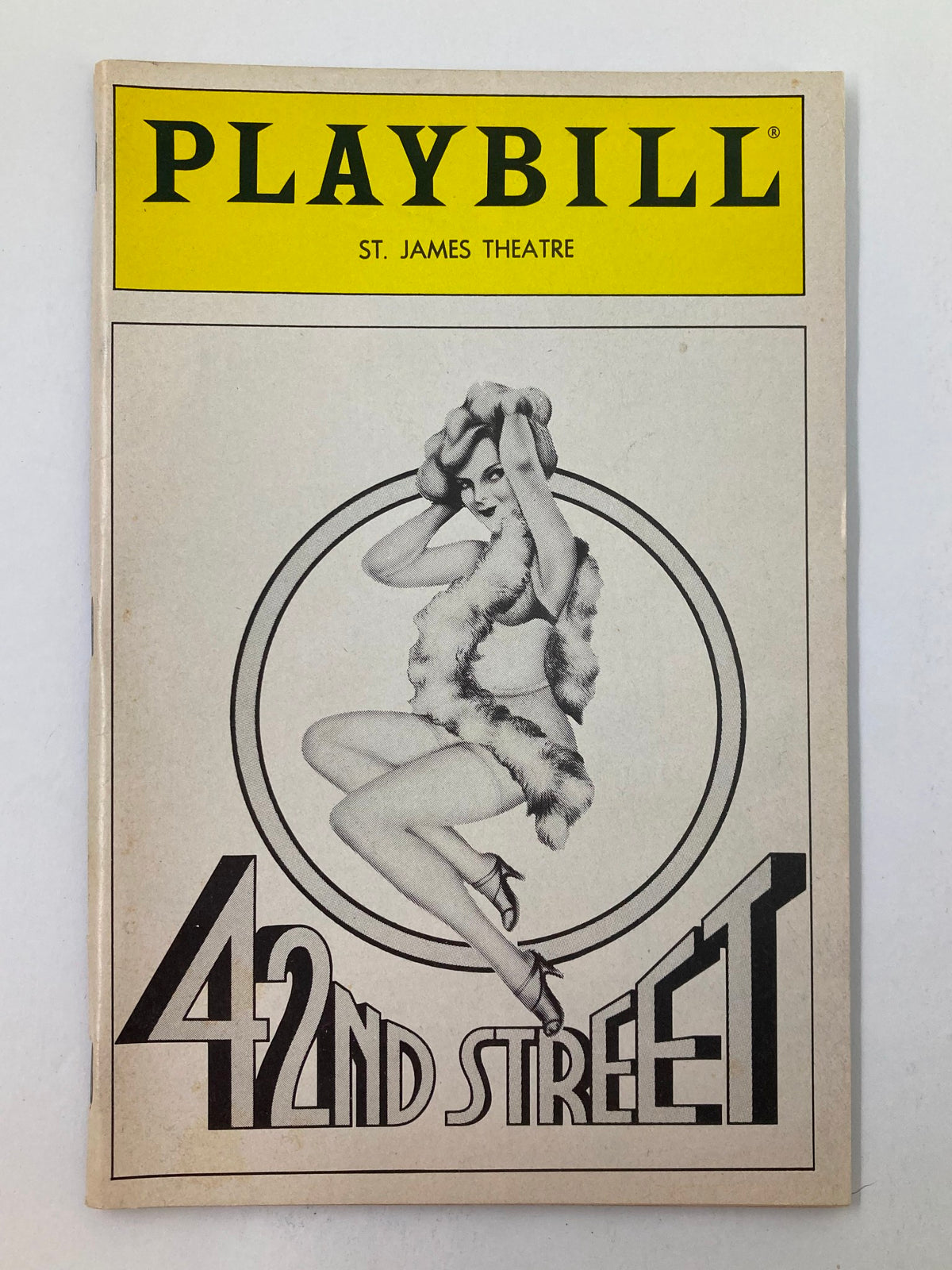 1988 Playbill from St. James Theatre featuring '42nd Street' with a striking cover illustration of a dancer.