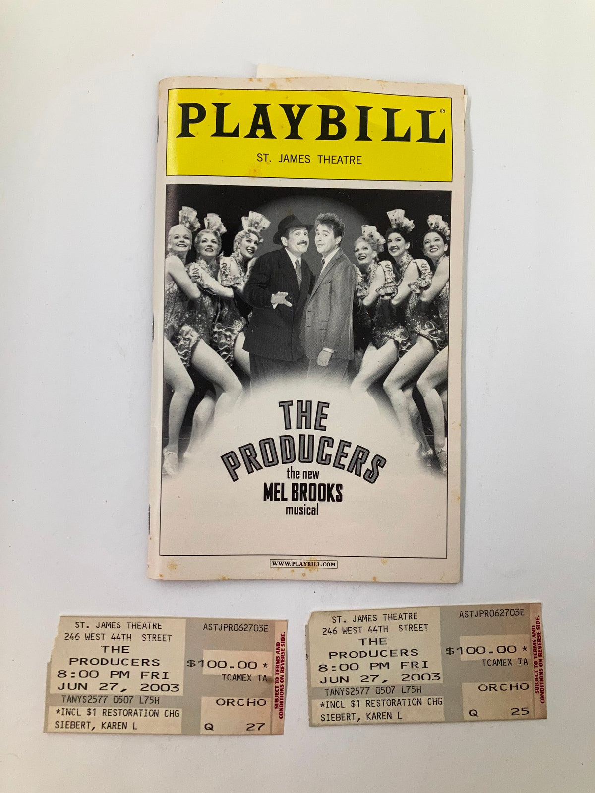 2003 Playbill from St. James Theatre featuring Lewis J. Stadlen in The Producers, showcasing ticket stubs and cast images from Mel Brooks' musical.