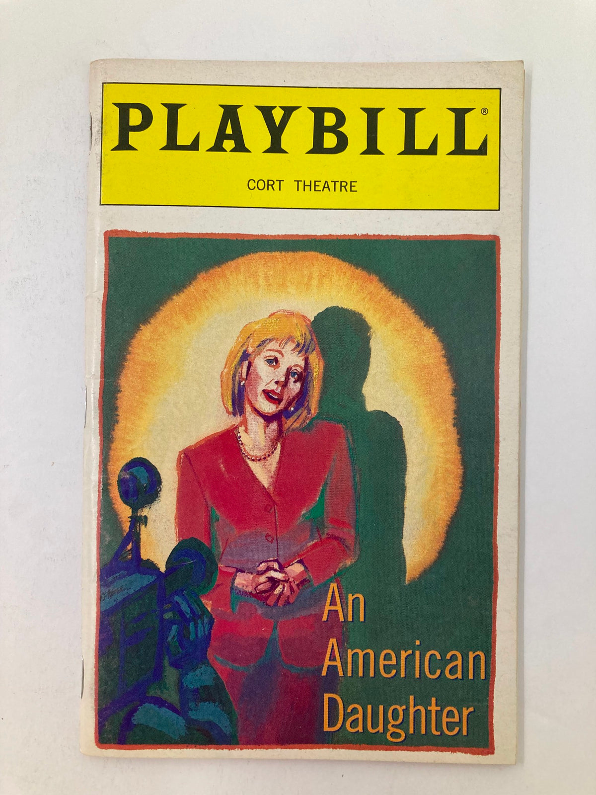 1997 Playbill for An American Daughter at Cort Theatre featuring a colorful illustration of Peter Benson's character.