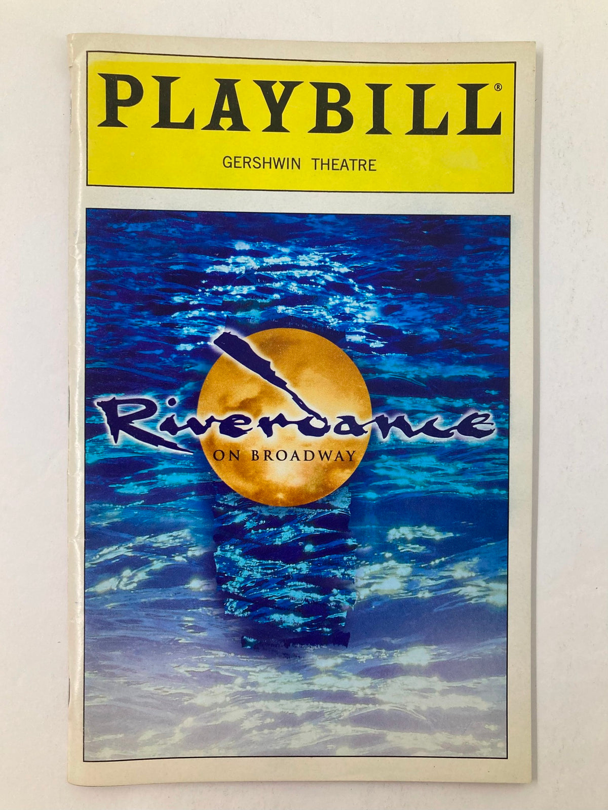 2000 Playbill for Riverdance at Gershwin Theatre featuring artistic cover design with ocean and sun motif.