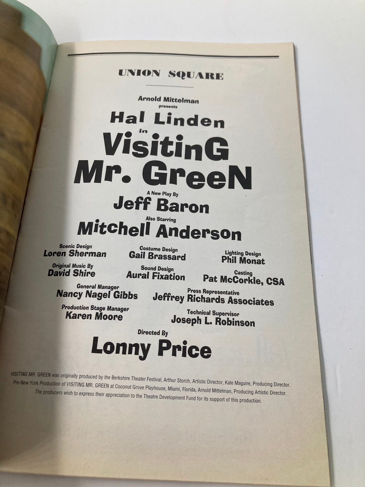 Cast list page from the 1998 Playbill for Visiting Mr. Green, highlighting the names of Hal Linden and Mitchell Anderson along with other cast and crew members involved in the production.