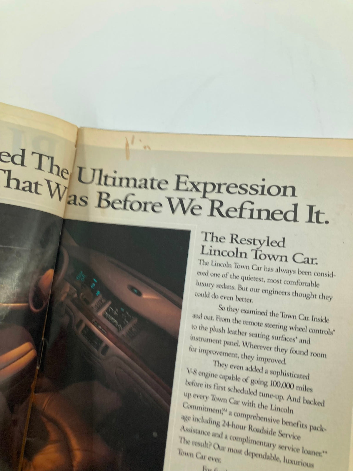 Close-up view of the interior of the 1995 Playbill for Jackie Mason's Politically Incorrect detailing the car features mentioned in the advertisement.