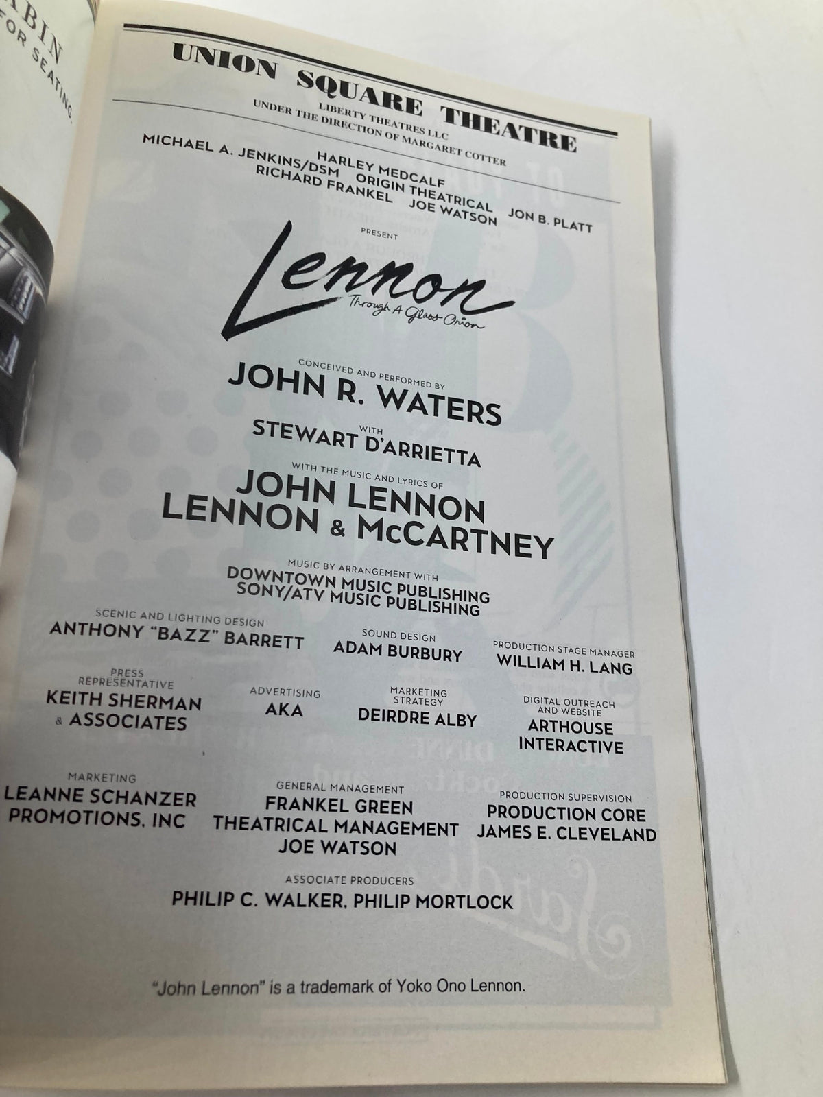 Playbill from the Union Square Theatre featuring John Lennon: Through a Glass Onion, highlighting the creative team and production details.