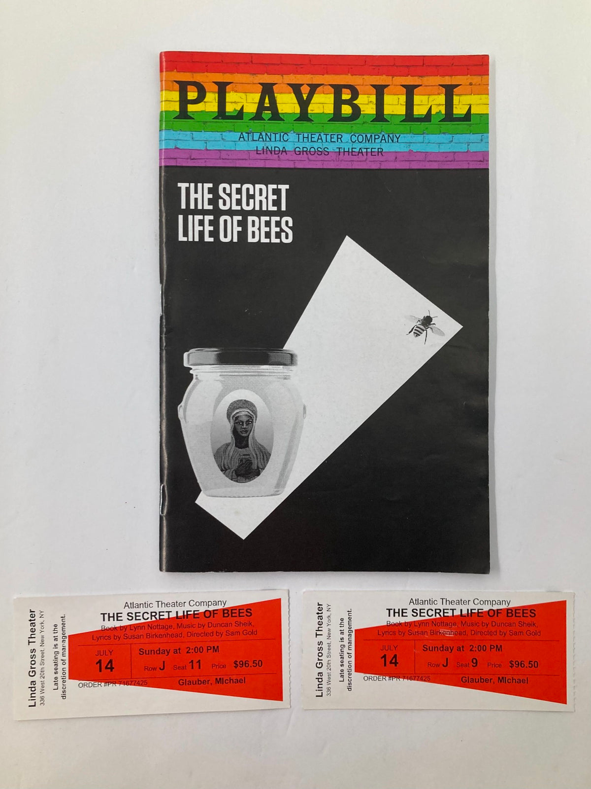 2019 Playbill for The Secret Life of Bees at the Linda Gross Theater, featuring Romelda Teron, accompanied by ticket stubs for the performance.