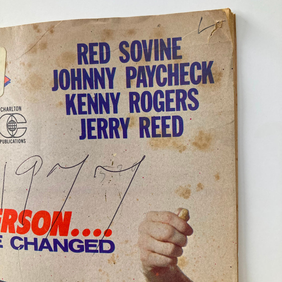 Close-up of VTG Country Song Roundup Magazine January 1977 highlighting Bill Anderson with text mentioning Red Sovine, Johnny Paycheck, Kenny Rogers, and Jerry Reed. The magazine shows signs of age with some markings.
