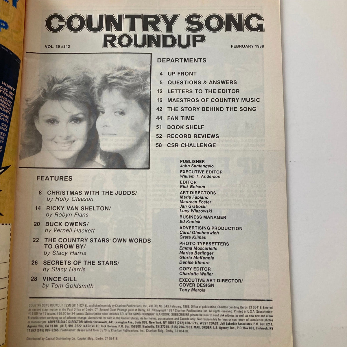 Inside spread of VTG Country Song Roundup Magazine from February 1988, detailing features including 'Christmas with The Judds' and notable articles, highlighting the vibrant culture of country music.