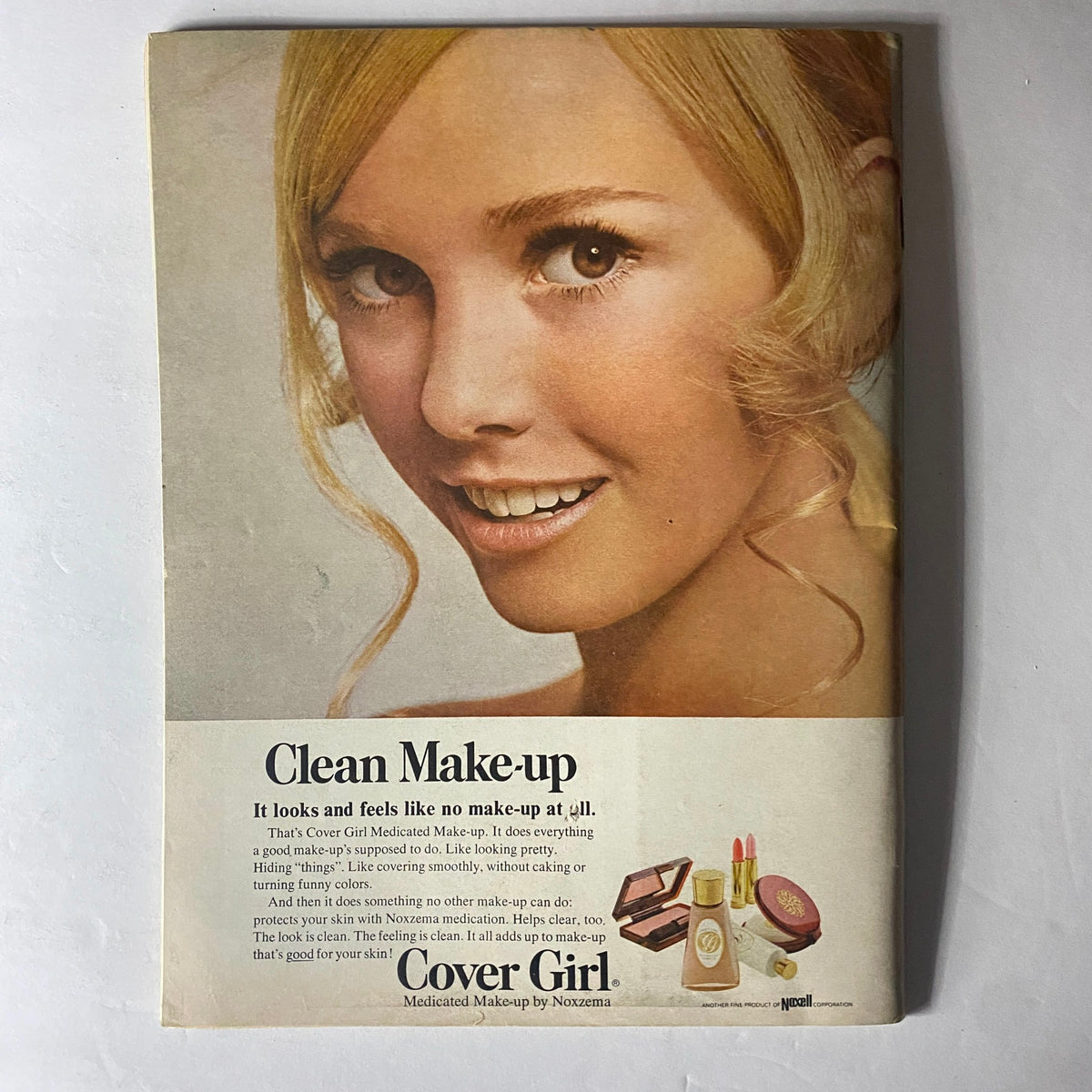 Advertisement for Cover Girl makeup in Teen Magazine February 1969, promoting clean makeup with a smile and glowing skin.