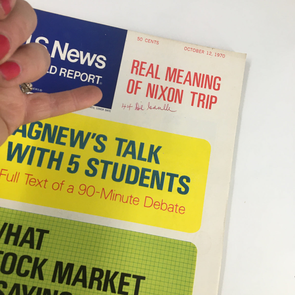 Close-up of the cover of US News & World Report Magazine October 12, 1970, showing the title 'Agnew's Talk with 5 Students' and handwritten inscription on the cover.