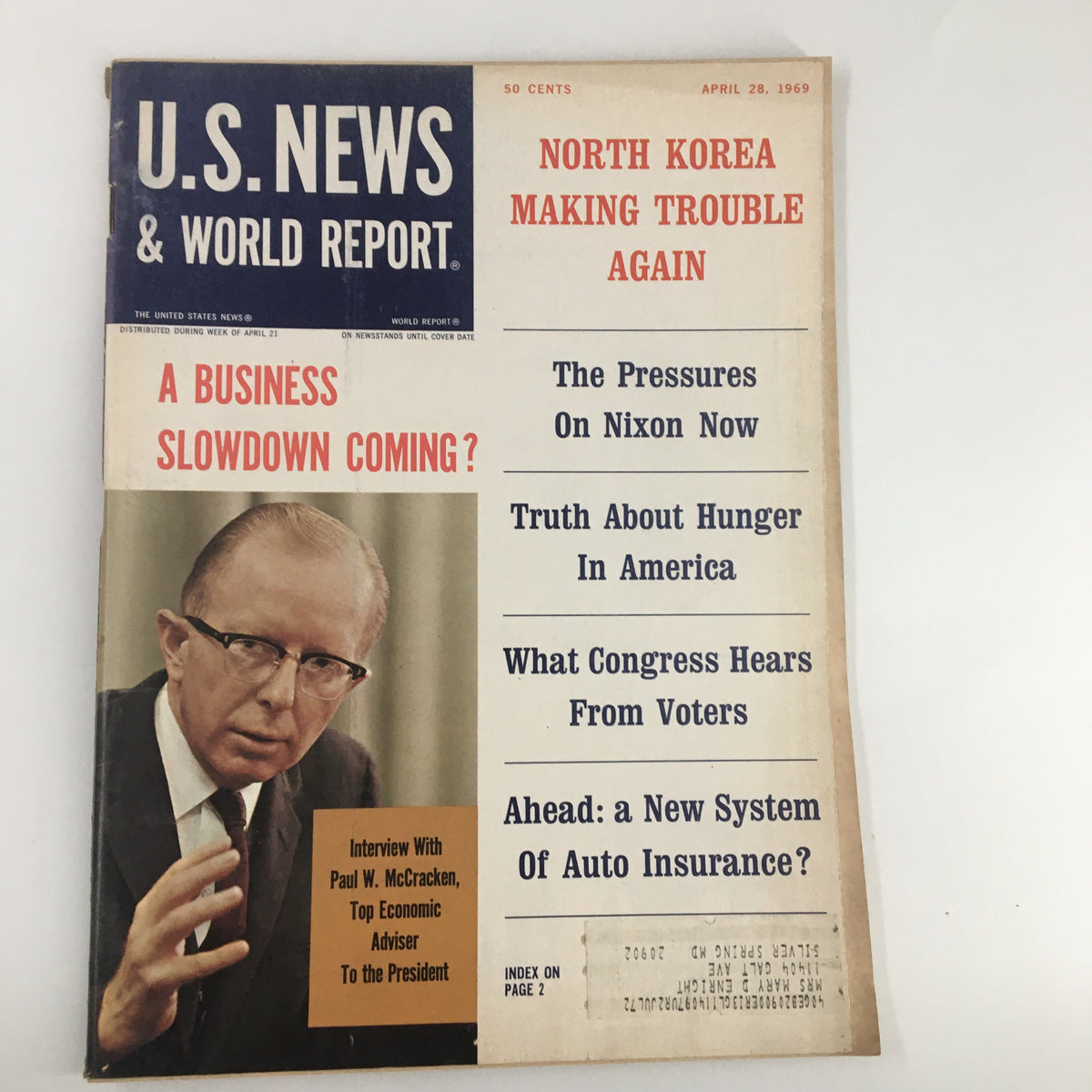 Cover of US News & World Report Magazine April 28 1969, featuring an interview with economist Paul W. McCracken and headlines about North Korea, business slowdown, and hunger in America.