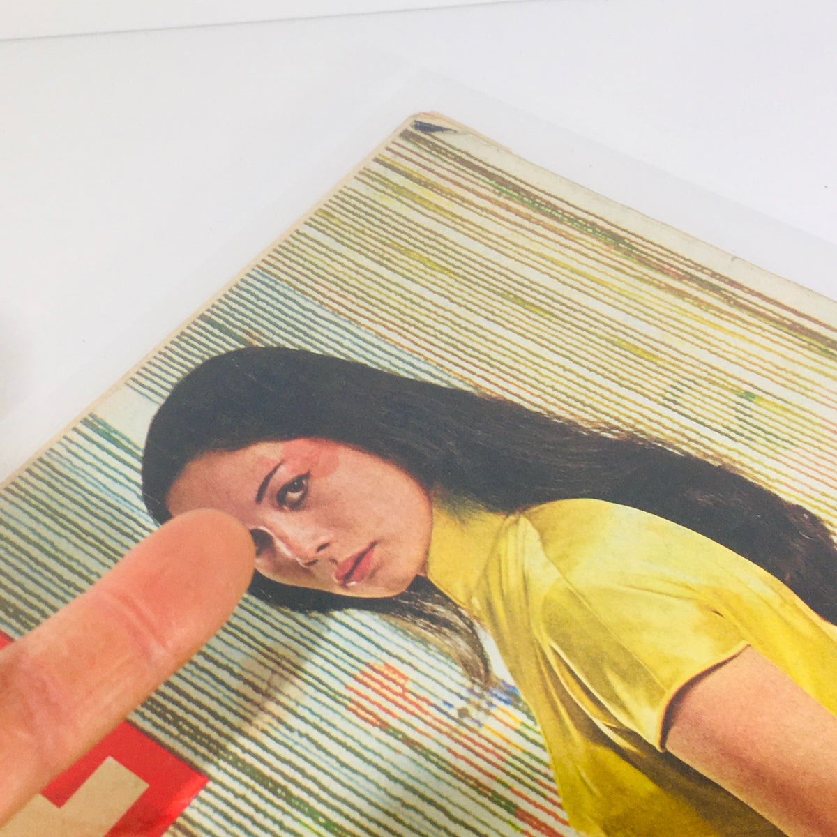 Vintage Life Magazine from October 24, 1960, featuring Nancy Kwan as Suzie Wong on the cover, showcasing classic early 1960s style with colorful striped background and notable design elements.