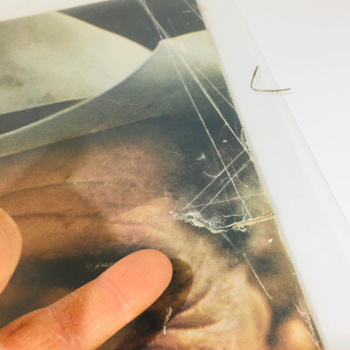 Close-up of the January 13, 1961, Life Magazine cover featuring Clark Gable, highlighting wear and age on the protective plastic covering.