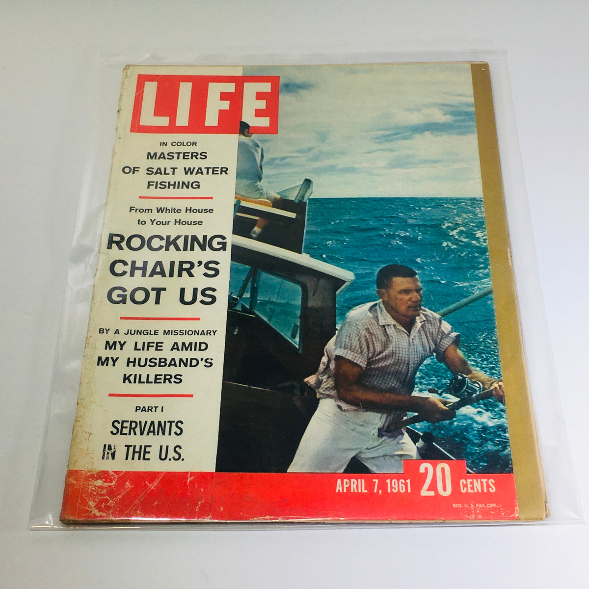 Vintage Life Magazine April 7 1961 cover featuring articles on Masters of Salt Water Fishing and Rocking Chair's Got Us with a fishing scene and ocean background.