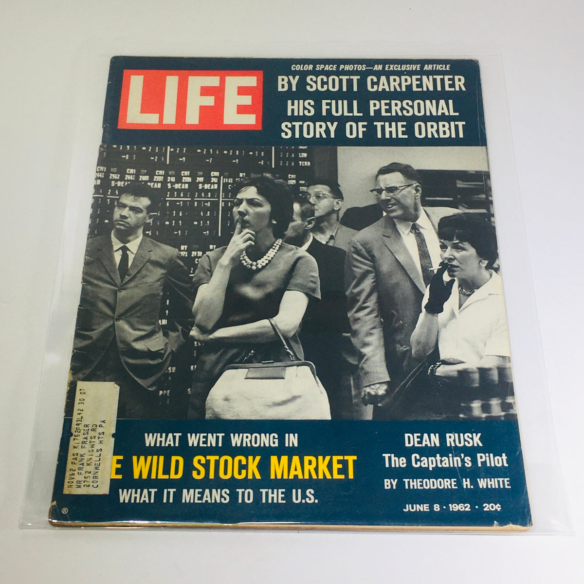 Cover of VTG Life Magazine dated June 8, 1962 featuring an exclusive story by Scott Carpenter titled 'Story of the Orbit'. The cover includes images of people in a financial setting, showcasing the vintage design and historical context of the magazine.