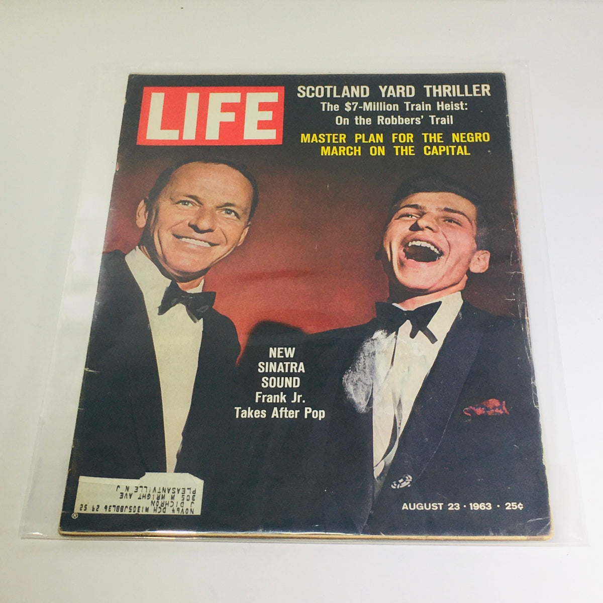 Vintage Life Magazine cover from August 23, 1963, titled 'New Sinatra Sound Frank Jr. Takes After Pop,' featuring iconic images of Frank Sinatra and Frank Sinatra Jr., reflecting the musical evolution of the 1960s.