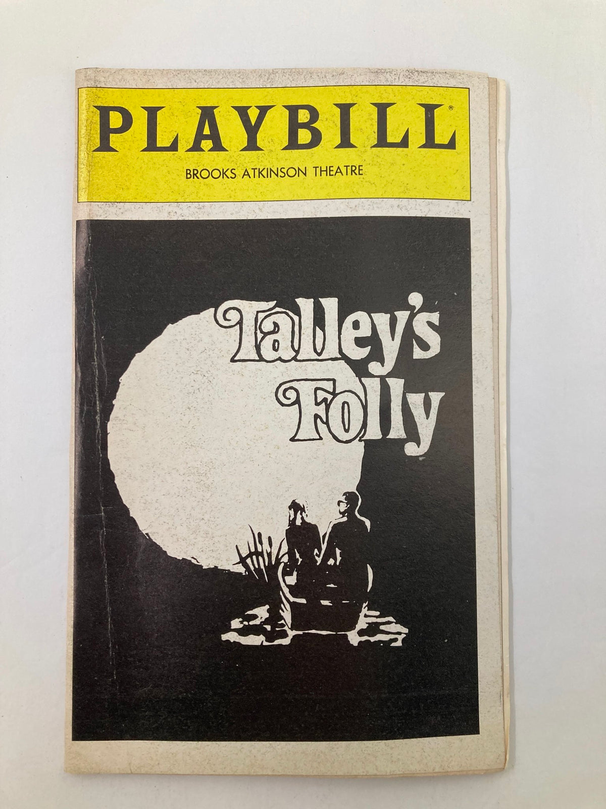 1980 Playbill for Talley's Folly at Brooks Atkinson Theatre featuring a striking black and white cover design with iconic imagery.