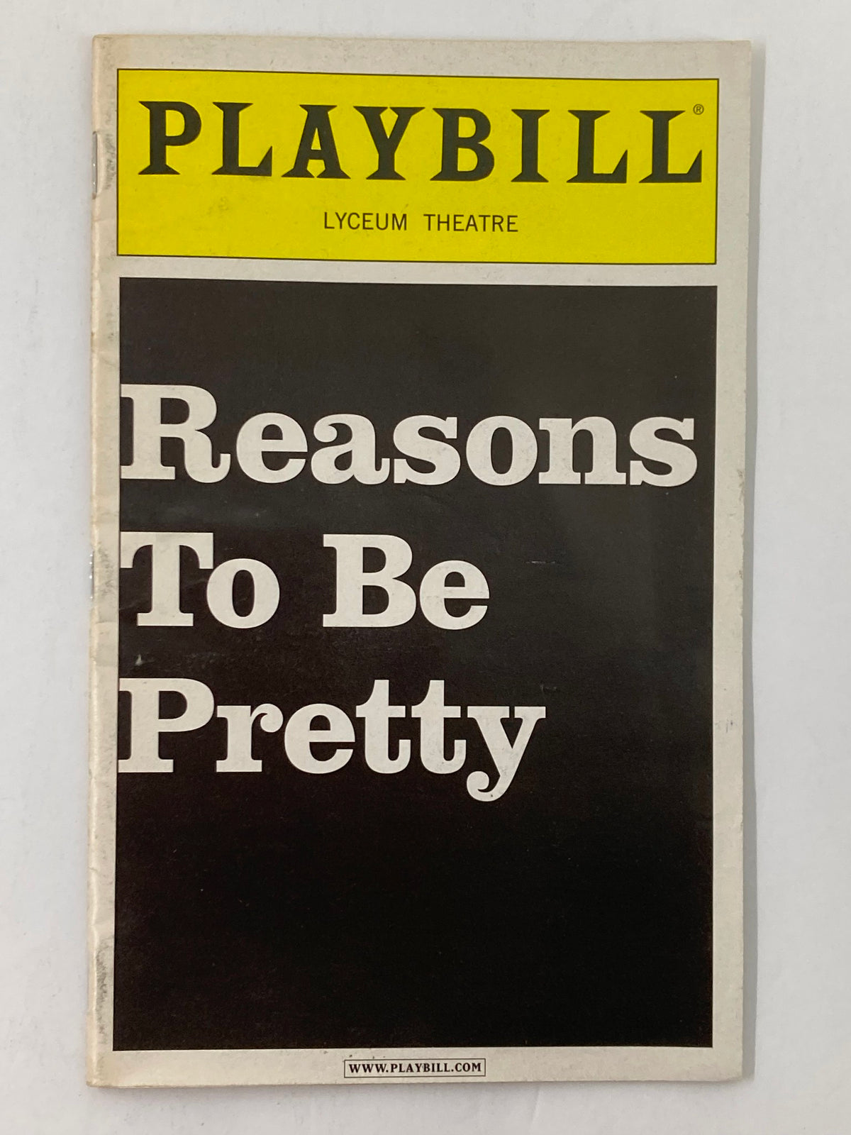 Front cover of the 2009 Playbill for 'Reasons To Be Pretty' at the Lyceum Theatre featuring Marin Ireland.